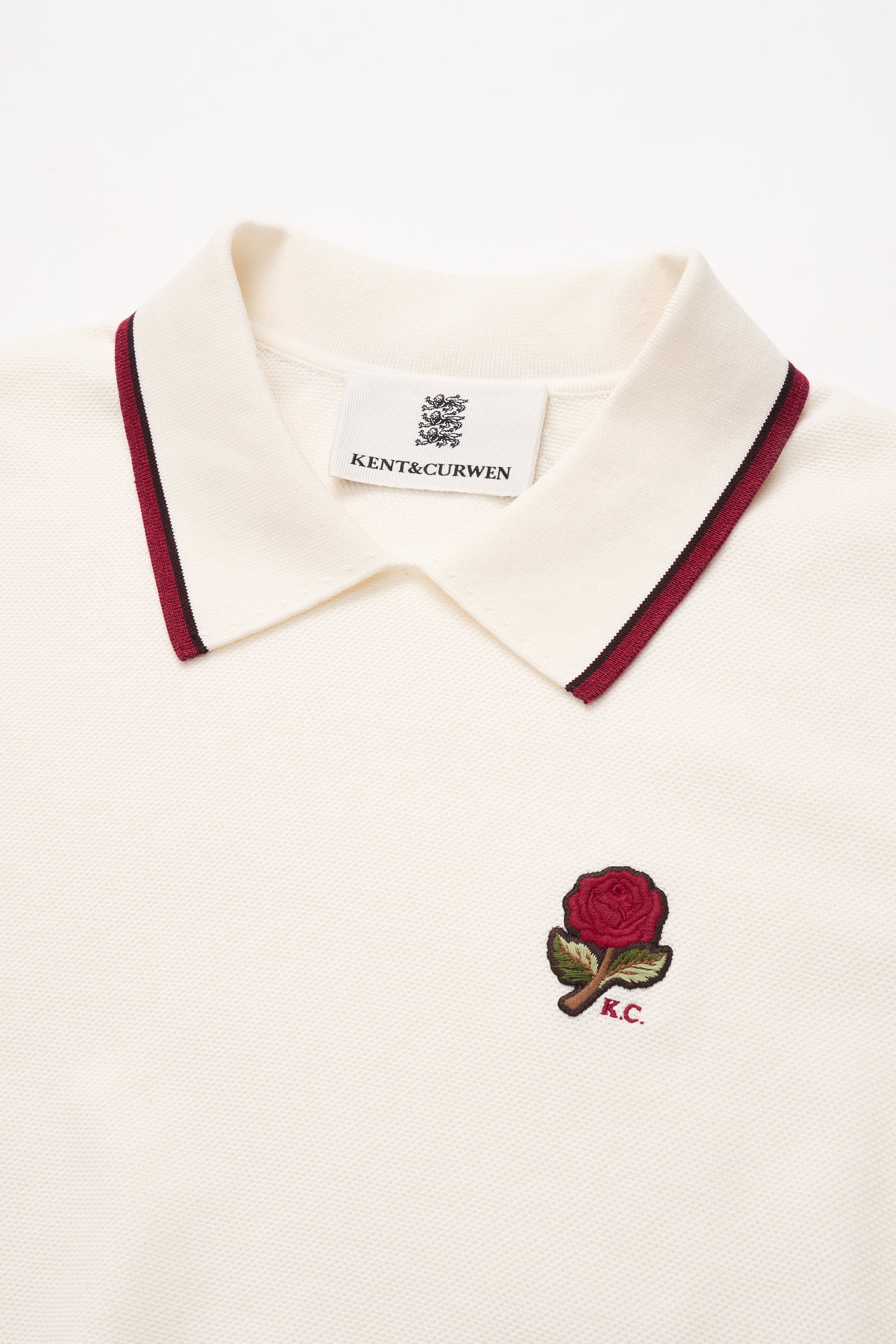 ロゼミューズ Logo embroidery polo knit tops Rose muse Logo
