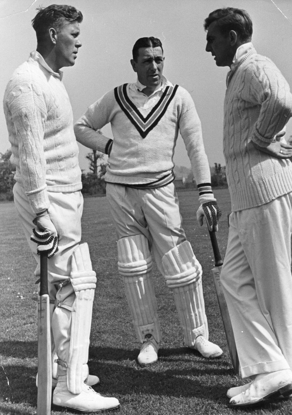 Various persons wearing or Kent and Curwen looks, to illustrate the brand.