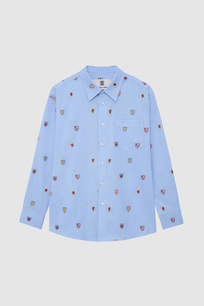 Light blue shirt with small colorful patterns
