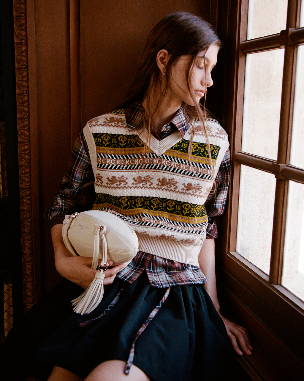 Various persons wearing or Kent and Curwen looks, to illustrate the brand.