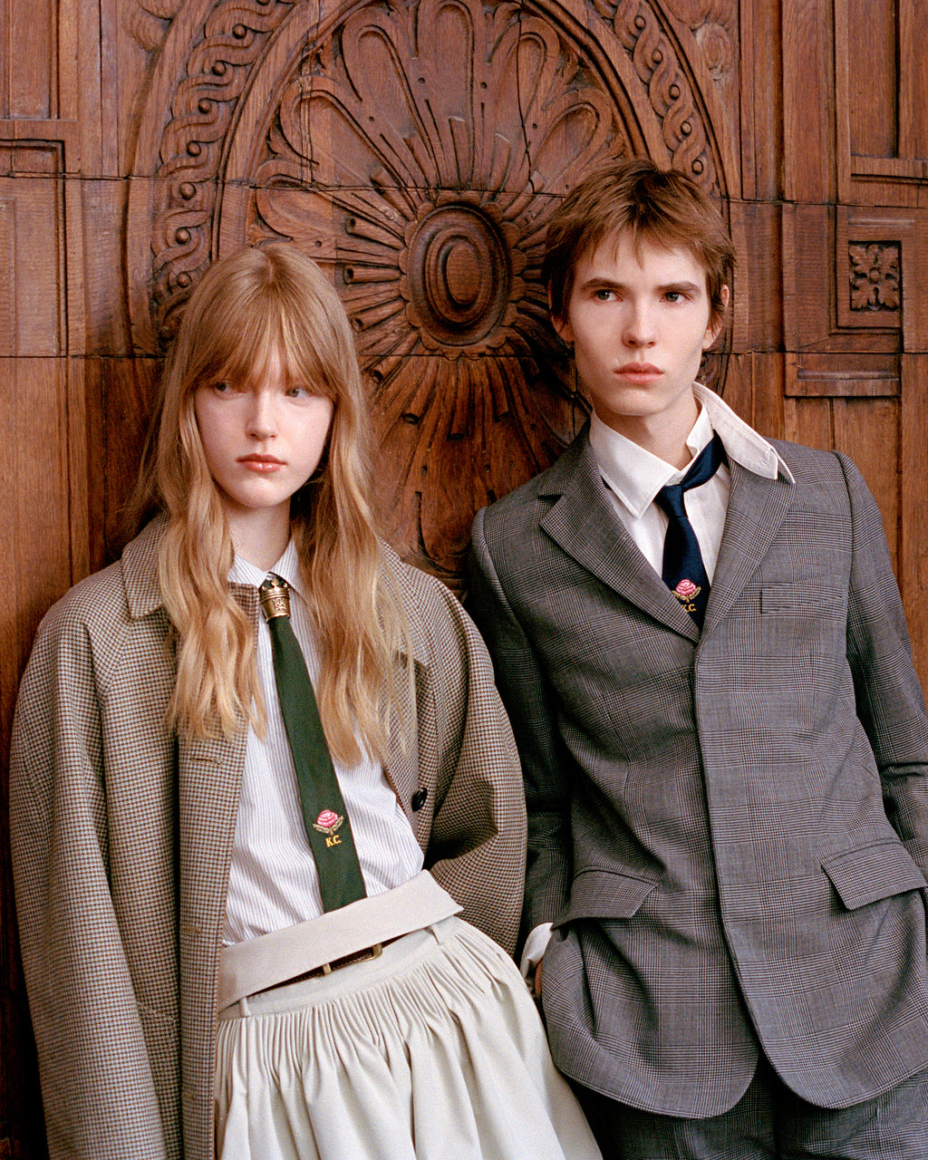 Various persons wearing or Kent and Curwen looks, to illustrate the brand.