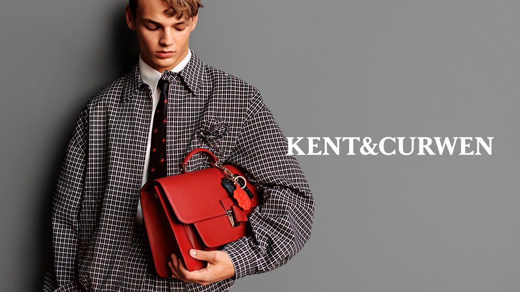 Various persons wearing or Kent and Curwen looks, to illustrate the brand.