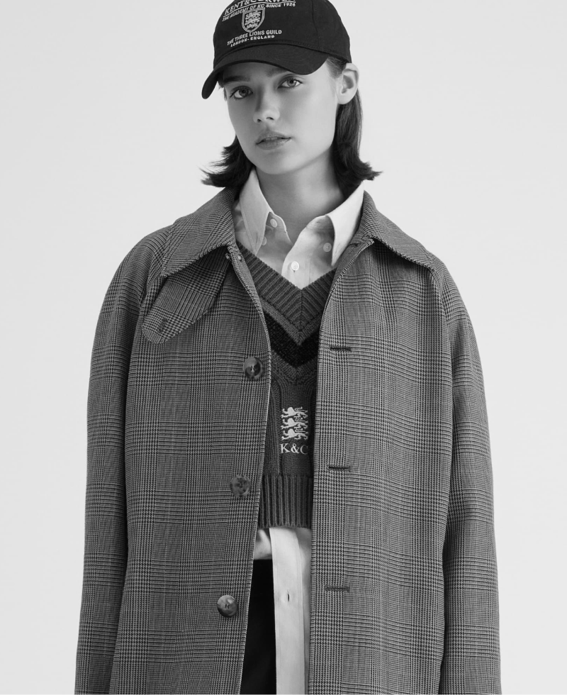 Various persons wearing or Kent and Curwen looks, to illustrate the brand.